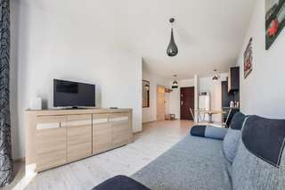 Апартаменты Apartamenty Sun&Snow Osiedle Bursztynowe Колобжег One-Bedroom Apartment - Baltycka 16A-8